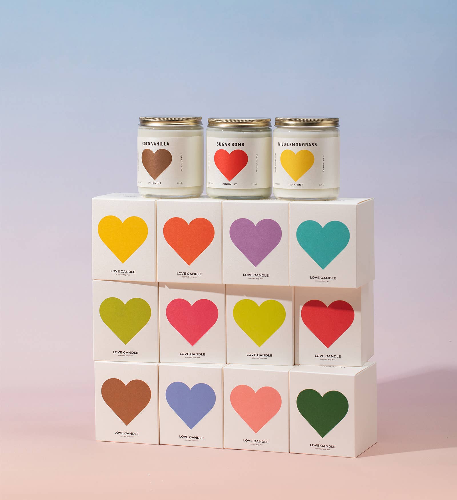 Candle set with colorful heart labels on a gradient background