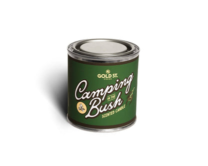 Canned scented candle labeled 'Camping in the Bush' by Gold St. on a white background