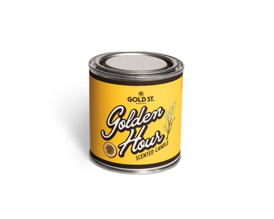 Gold ST. Golden Hour scented candle can on a white background