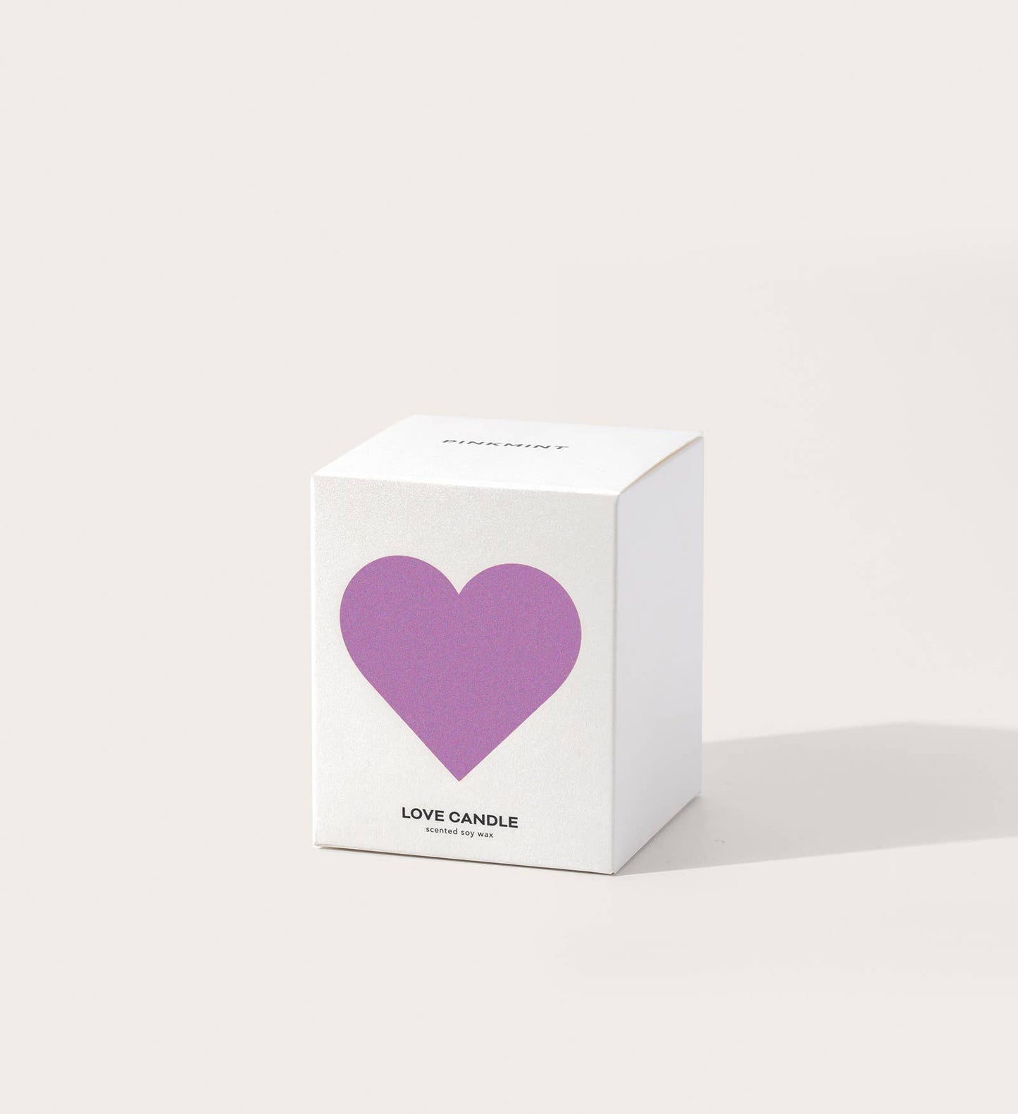 White box with a purple heart and 'Love Candle' text on a white background