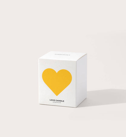 White box with a yellow heart and 'Love Candle' text on a white background